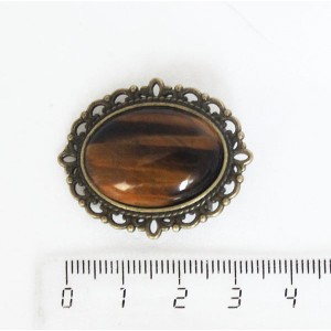 Брошь из тигрового глаза, овал 25х18мм, оправа с узором цвет бронза