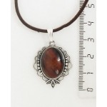 Кулон из бычьего глаза, овал 18х13мм, оправа "трилистник"