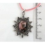 Кулон из родонита, овал 18х13мм, оправа "папоротник"