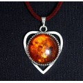 Кулон из янтаря (переплавленный), цвет коньячный, круг 18мм, оправа "сердечко"