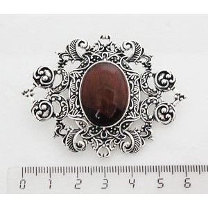 Брошь из бычьего глаза "филигрань", овал 25х18мм