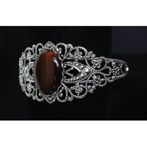 Браслет из бычьего глаза, овал 25х18мм, жесткая основа цвет ант.серебро