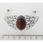 Браслет из бычьего глаза, овал 25х18мм, жесткая основа цвет ант.серебро