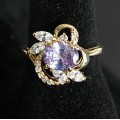 Кольцо с цирконом сиреневым "4 стразы + цирконы"