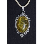 Кулон из янтаря (переплавленый), цвет желтый, овал 25х18мм, оправа "медальон"