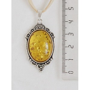 Кулон из янтаря (переплавленый), цвет желтый, овал 25х18мм, оправа "медальон"