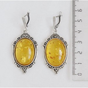 Серьги из янтаря (переплавленый), цвет желтый, овал 25х18мм, оправа "медальон", швензы посеребрение