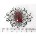 Брошь из яшмы красно-коричневой "филигрань", овал 25х18мм