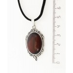 Кулон из бычьего глаза, овал 25х18мм, оправа "медальон"