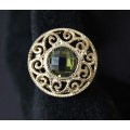 Кольцо с хризолитом (темный) "восточное солнце"