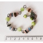 Браслет из морганита (крупная плоская галтовка) и оникса (шарик 8 и 10 мм), на колечках