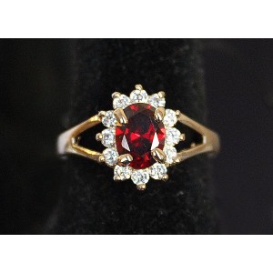 Кольцо с гранатом "малый овал в цирконах"