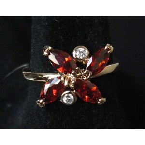 Кольцо с гранатом "цветочек 2 циркона"