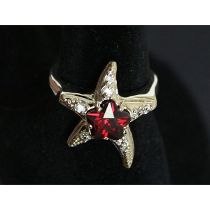 Кольцо с гранатом "морская звезда"